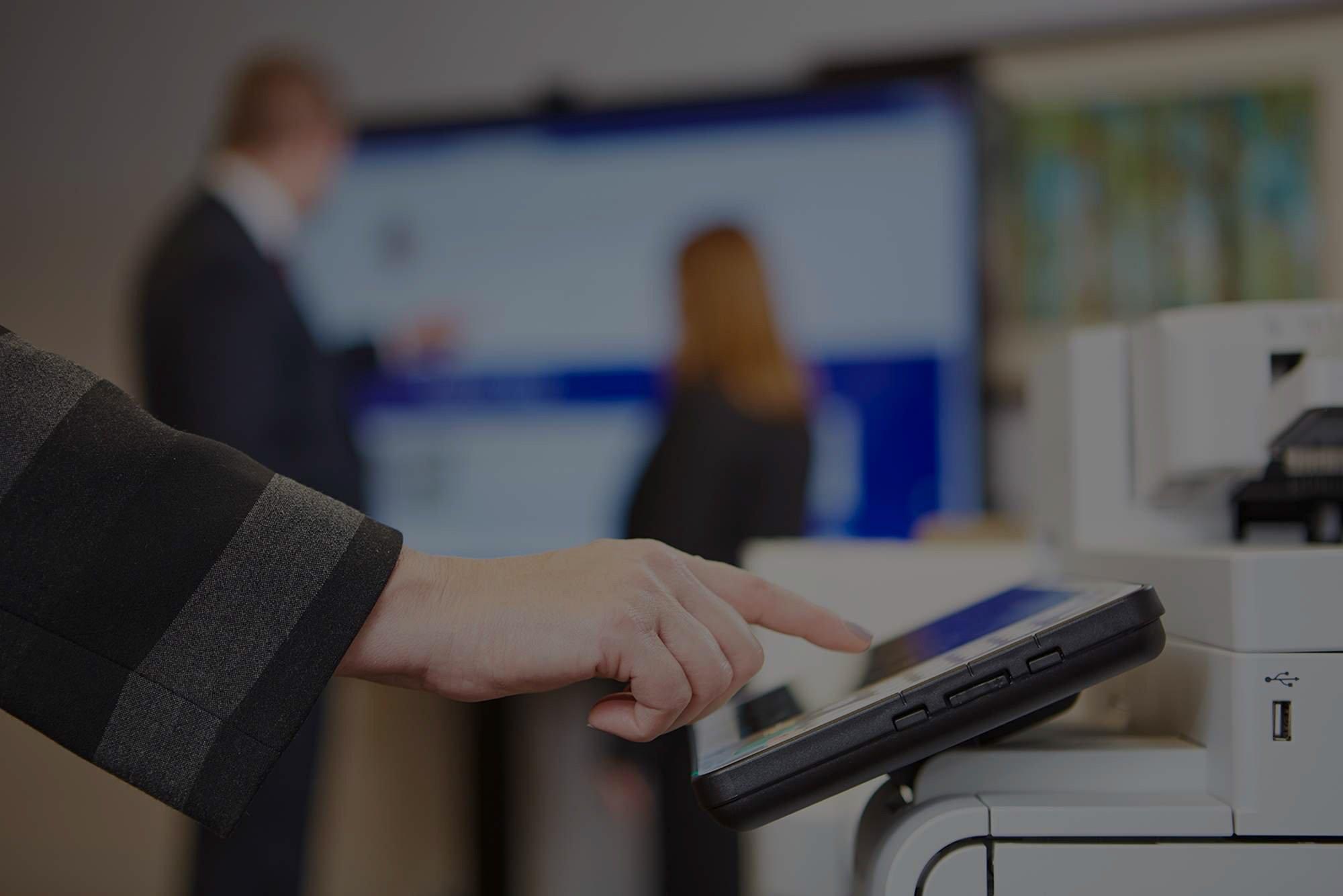 hand-interacting-with-touch-screen-on-printer-drk hand-interacting-with-touch-screen-on-printer-drk
