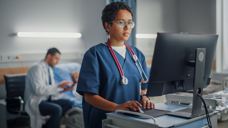 nurse-entering-health-data-on-computer